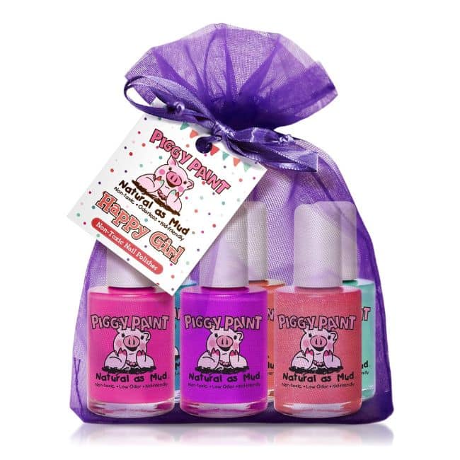 package of piggy paint kid friendly nail polishes in purple bag